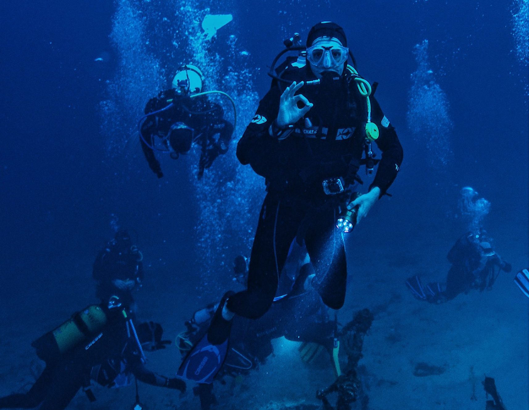 Diver underwater facing the camera